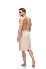 Fototapeta premium man covering with towel after shower