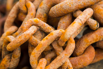 Old rusty heavy iron chain, close-up