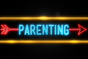 Parenting  - fluorescent Neon Sign on brickwall Front view
