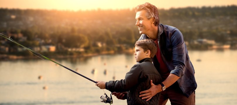 Composite image of father teaching his son fishing 