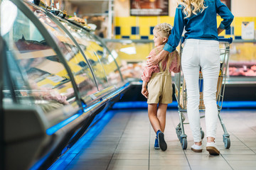 family at grocery shop