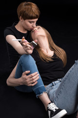 lesbian couple embracing