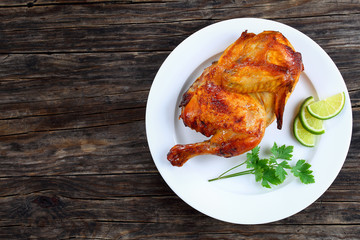 half of appetizing grilled juicy chicken