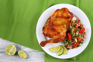 half of delicious grilled juicy chicken