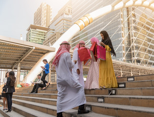 Multiethnic group of businesspeople meeting outdoors in a modern city