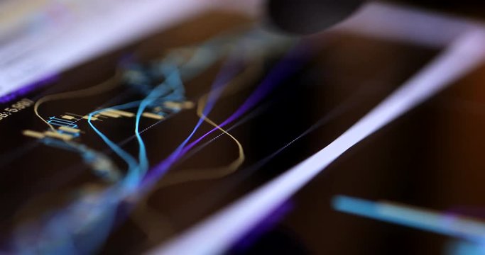 Stock market graph on tablet computer screen