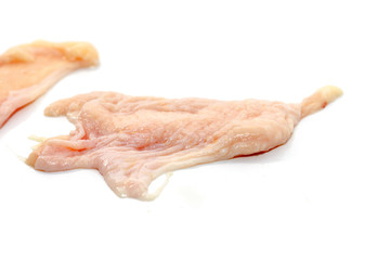 raw chicken skin isolated on white background