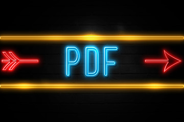 Obraz premium Pdf - fluorescent Neon Sign on brickwall Front view