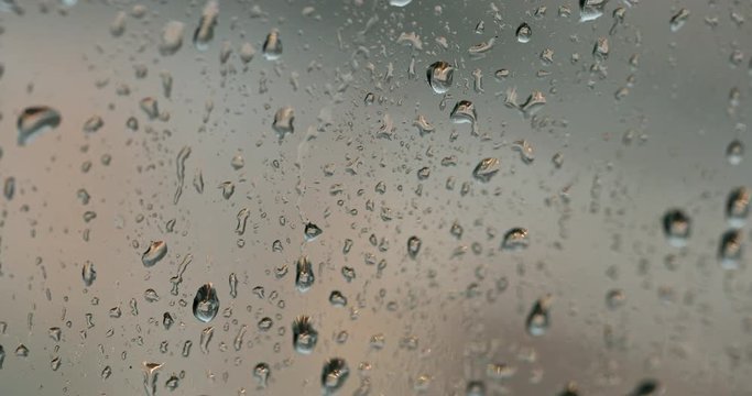 Rain drops falling on a window