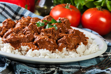 Chicken tikka masala served with rice