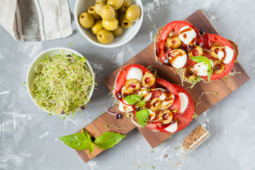 sandwiches with mozzarella, tomatoes and olives
