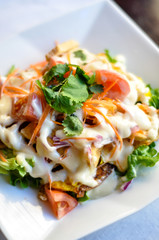 Tofu Salad, Fried egg, tofu, lettuce, tomato, onion, carrot with special creamy dressing.