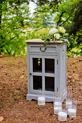 Wedding decorations in rustic style. Wedding at nature in the forest.
