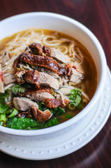 Duck Noodle Soup, Thin rice or egg noodles with bean sprouts, green onion & cilantro in the broth.