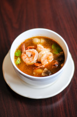 Shrimp Tom Yum, Mushroom, tomatoes, lemongrass, lime leave, galangal in Thai chili sour broth.