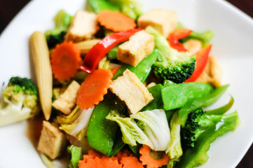 Stir-Fried Mixed Vegetables, Stir-fried broccoli, baby corn, carrots, peapods, napa and bell pepper in a soy sauce.