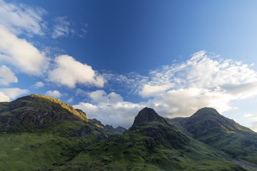 The three sisters Beinn Fhada, Gearr Aonach, and Aonach Dubh as seen from Glen Coe in Scotland.