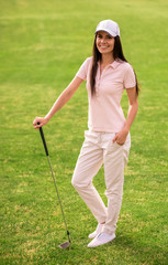 Woman playing golf