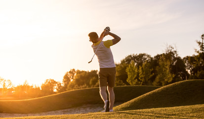 Fototapeta premium Guy playing golf