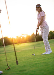 Fototapeta premium Couple playing golf