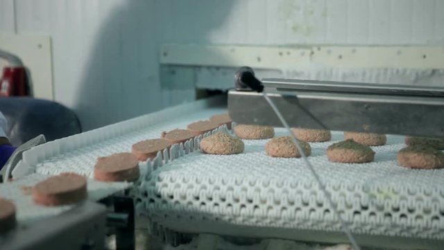 Meat production conveyor