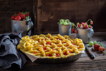 Sweet and sour pie made of fresh berry fruits