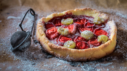 Homemade and rustic pie made of fresh berry fruits