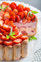 Delicious cake with fresh fruits and biscuits