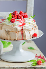 Delicious and crispy Pavlova cake with berries and meringue
