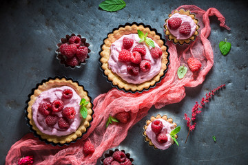 Tasty and fresh tarts made of berries and cream