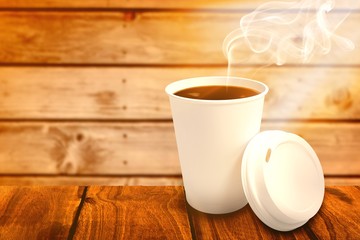 Composite image of dark coffee on white cup over white