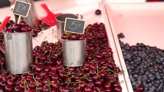 Street market in Europe. Selling berries