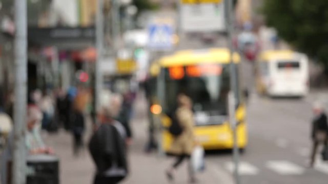 Bus stop in the European city. Blurred background