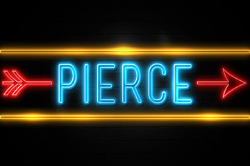 Obraz premium Pierce - fluorescent Neon Sign on brickwall Front view