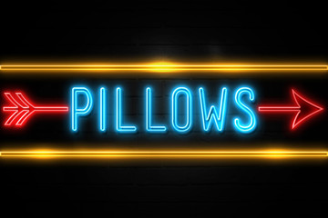 Pillows  - fluorescent Neon Sign on brickwall Front view