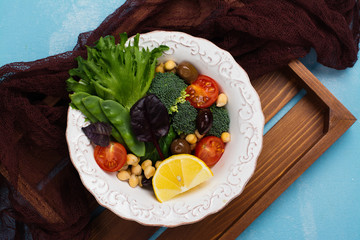 Raw food diet or clean eating concept. Fresh summer vegetarian meal. Space for text