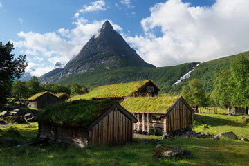 Mountain valley Innerdalen with a mirror lake in Norway