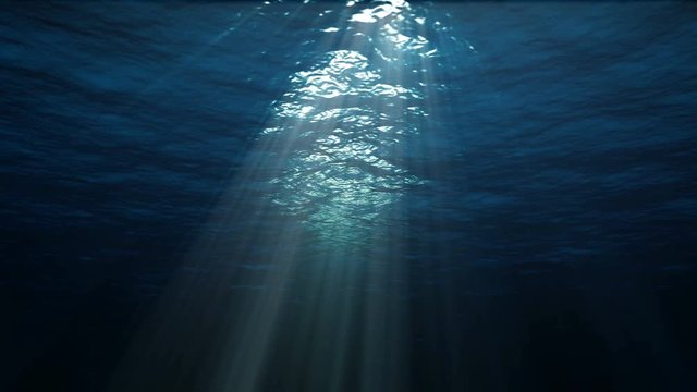 4K blue underwater ocean waves seamless loop animation, light rays pass through the water