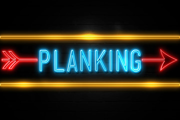 Planking  - fluorescent Neon Sign on brickwall Front view