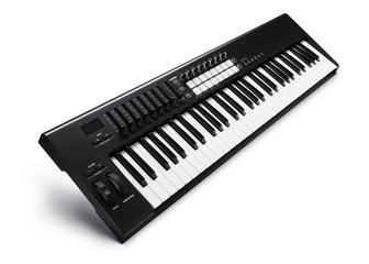 Electronic synthesizer piano isolated on white with clipping path
