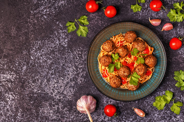 Roasted  meatballs with spaghetti.