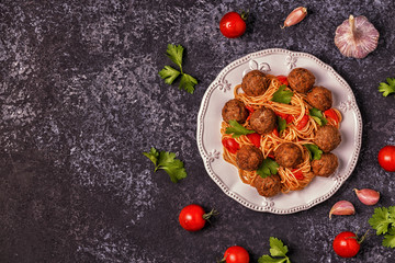 Roasted  meatballs with spaghetti.