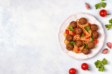 Roasted  meatballs with spaghetti.