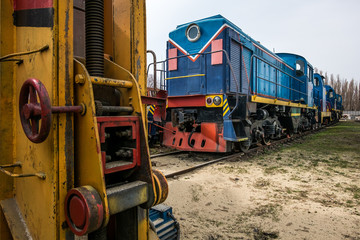 big russian locomotive in the repair workshop for old trains