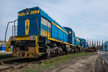 Fototapeta na wymiar big russian locomotive in the repair workshop for old trains