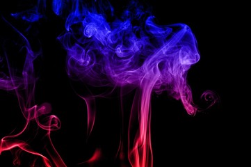 Movement of smoke,Red and blue smoke swirl on black background, Color smoke on black background