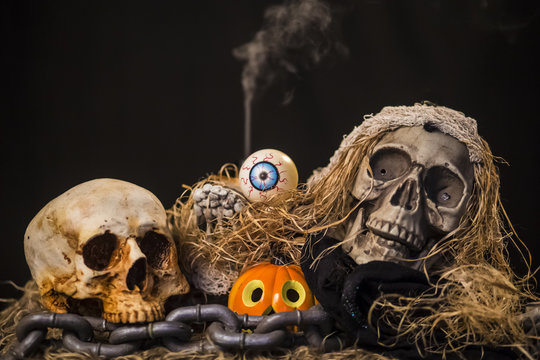 holiday decor Halloween skull  and pumpkins,