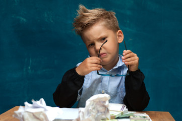 Child imitating tired businessman or office worker