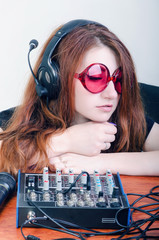 girl behind the music console © skilas