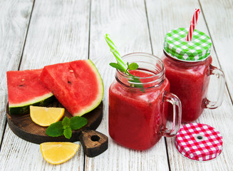 Jars with watermelon smoothie